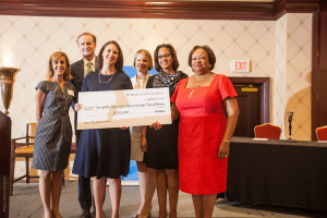 Juanita James, President and CEO of Fairfield County’s Community Foundation receive $200,000 check from JPMorgan Chase & Co. for Thrive by 25 initiative. From left to right: Laura Davis, Jonathan England, Pepper Anderson, Carolyn Reers, Michelle Henry, all of JPMorgan Chase & Co. and Juanita James